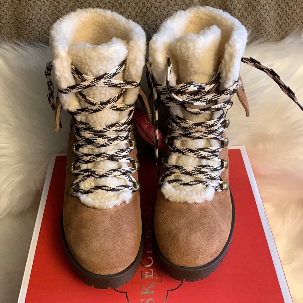New Sketchers amid Hiker Boot.